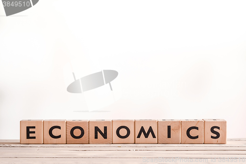 Image of Economics sign on a desk