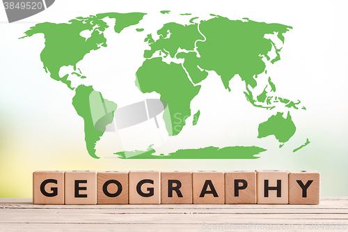 Image of Geography sign with a world map