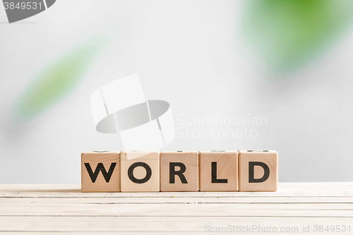 Image of World sign on a wooden table