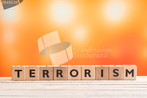 Image of Terrorism headline made of wood