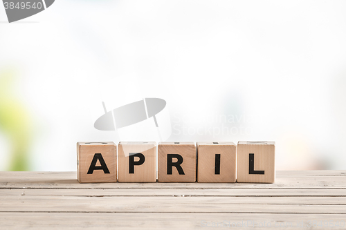 Image of April sign with wooden cubes