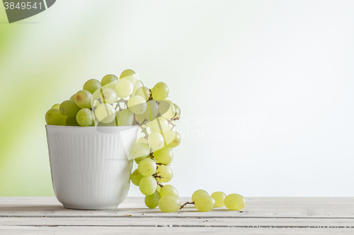 Image of Cup with green grapes