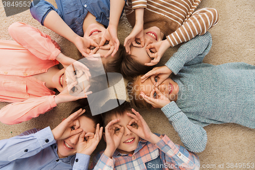 Image of happy children making faces and having fun