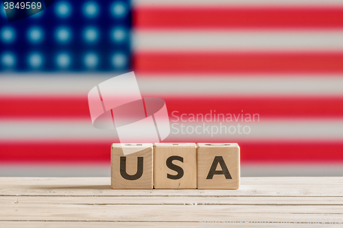 Image of USA sign made of wooden cubes