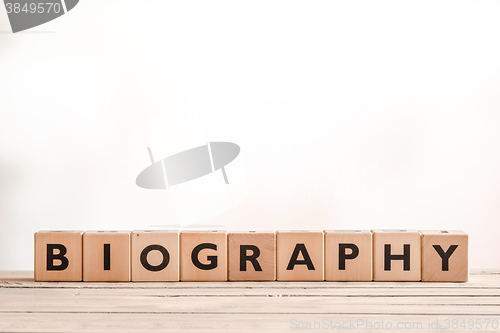 Image of Biography headline sign on a table