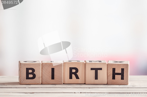 Image of Birth sign made of wooden cubes