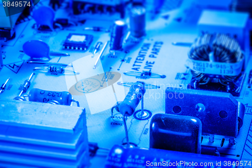 Image of Electronics board with capacitors and chips