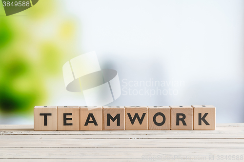 Image of Teamwork message made of cubes