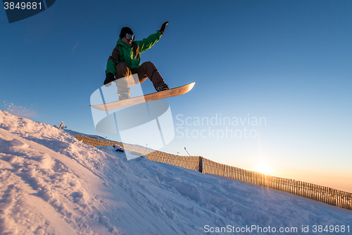 Image of Snowboarder at jump