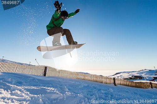 Image of Snowboarder at jump