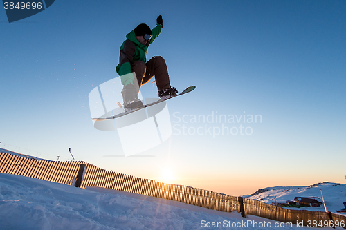 Image of Snowboarder at jump