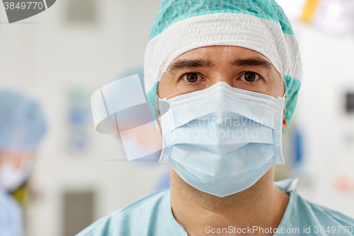 Image of surgeon in operating room at hospital