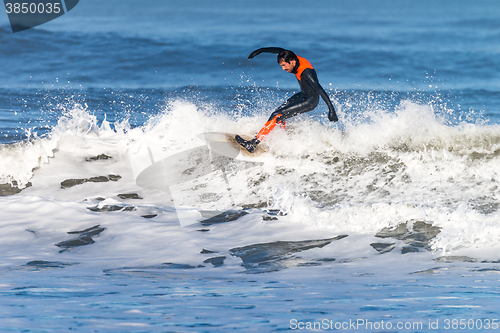 Image of Surfing the waves