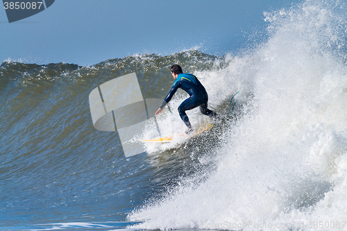 Image of Surfing the waves