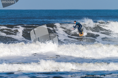 Image of Surfing the waves