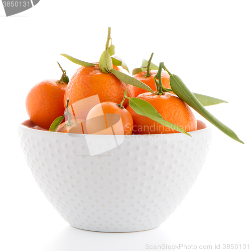 Image of Tangerines on ceramic white bowl 