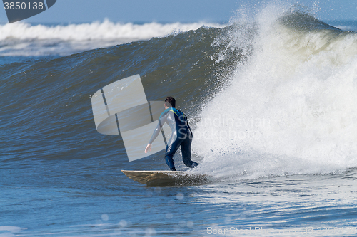 Image of Surfing the waves