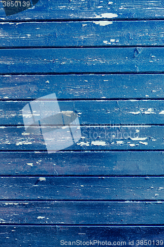 Image of Blue paint on wood background