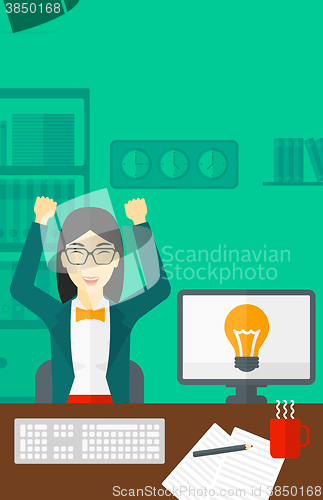 Image of Woman working at office.