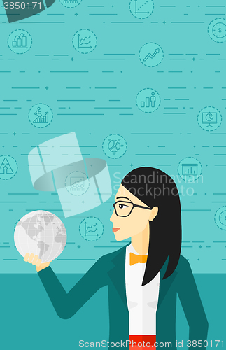 Image of Woman holding globe.