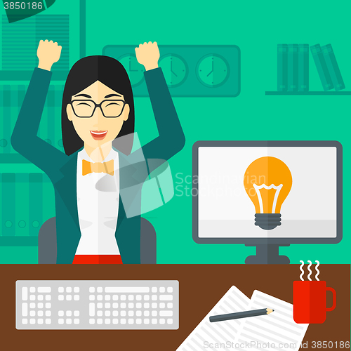 Image of Woman working at office.