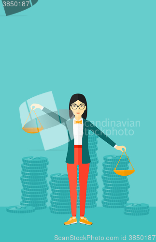 Image of Business woman with scales.