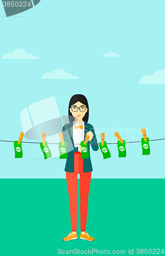 Image of Woman loundering money.