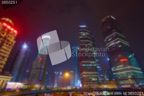 Image of Shanghai skyline at night out of focus. 