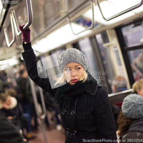 Image of Woman on subway.