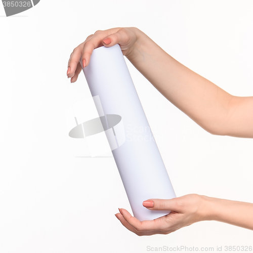 Image of The cylinder female hands on white background