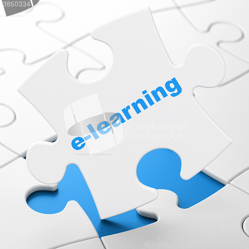 Image of Education concept: E-learning on puzzle background