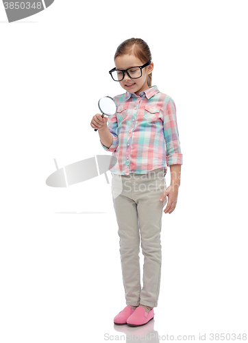 Image of little girl in eyeglasses with magnifying glass