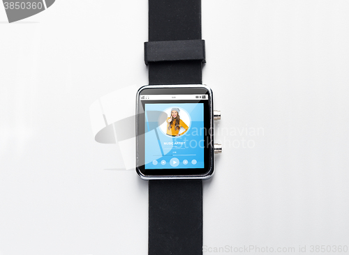 Image of close up of smart watch with music player