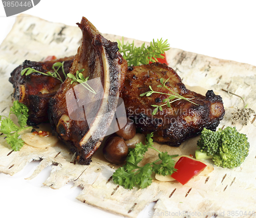 Image of Pork ribs with mushrooms and herbs