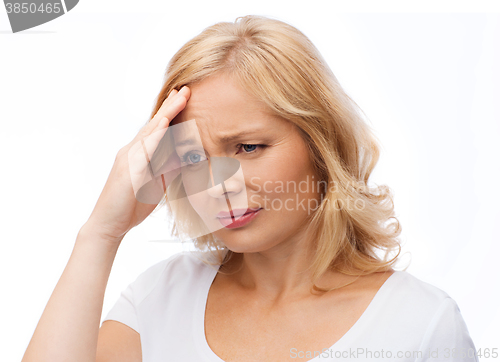 Image of unhappy woman suffering from headache