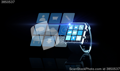 Image of close up of black smartwatch with app icons