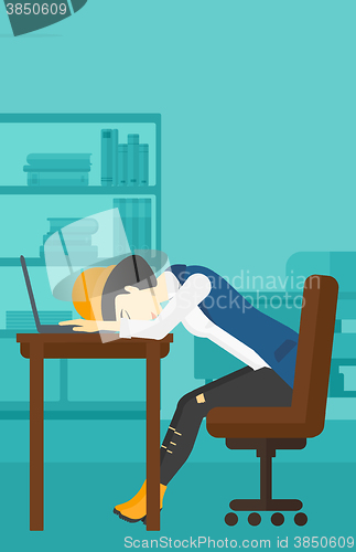 Image of Woman sleeping on workplace.