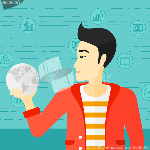 Image of Man holding globe.
