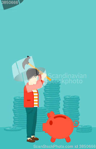 Image of Man breaking piggy bank.