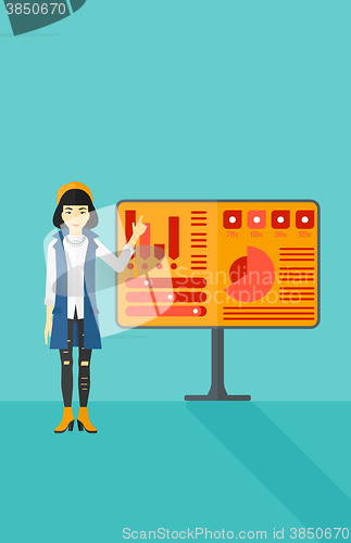 Image of Woman presenting report.