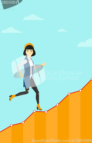 Image of Business woman walking upstairs.