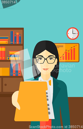 Image of Boss receiving file from employee.