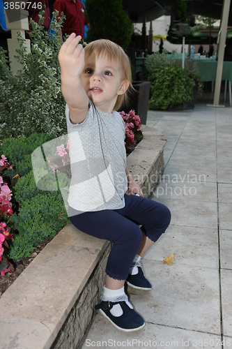 Image of Cute baby girl on the wall