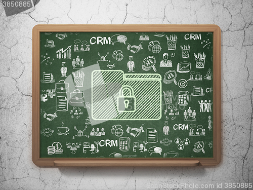 Image of Finance concept: Folder With Lock on School board background