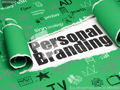 Image of Advertising concept: black text Personal Branding under the piece of  torn paper