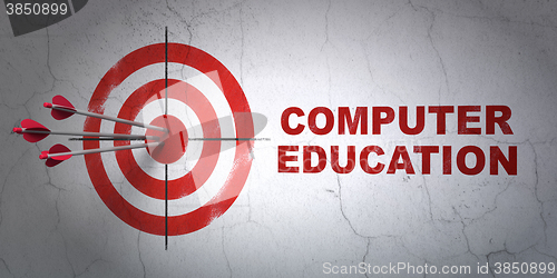 Image of Learning concept: target and Computer Education on wall background