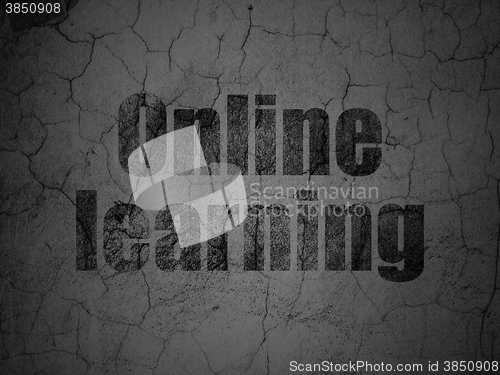Image of Studying concept: Online Learning on grunge wall background