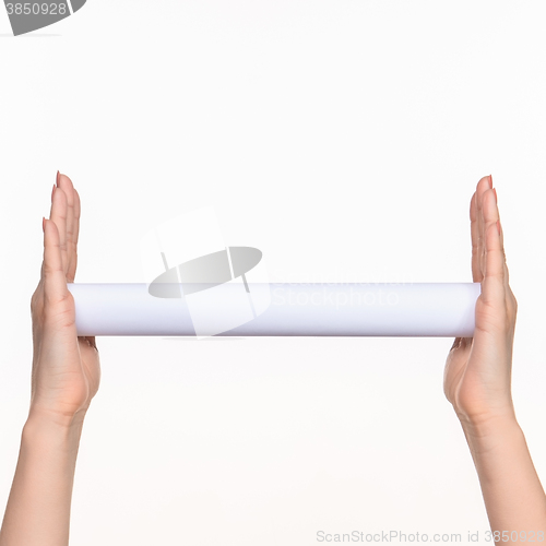 Image of The cylinder female hands on white background