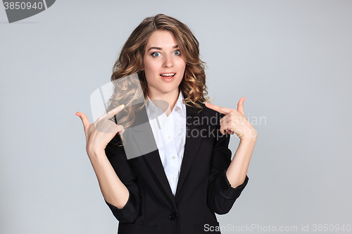 Image of Portrait of young woman with shocked facial expression