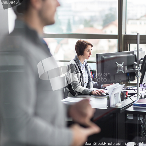 Image of Personal assistant working in corporate office.